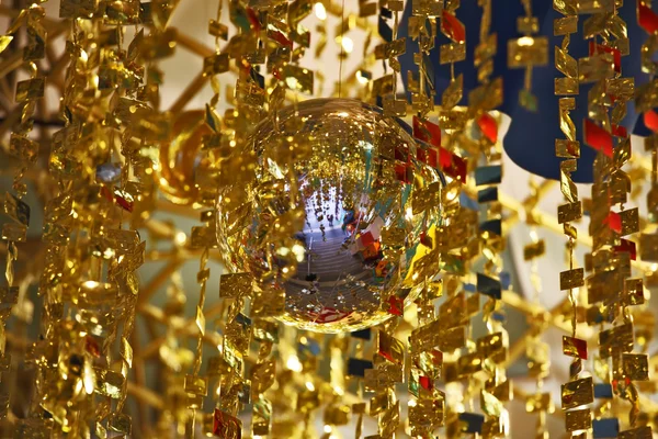 Mirror spheres and gold tinsel — Stock Photo, Image
