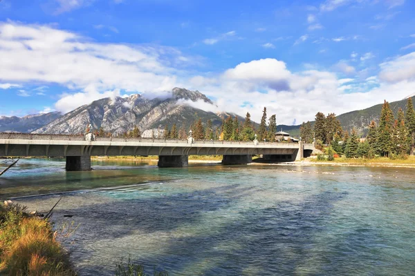 The bridge across mountain river Banff — Stock Photo, Image