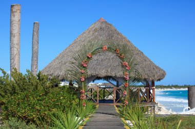 Wedding gazebo on the Caribbean coast. clipart