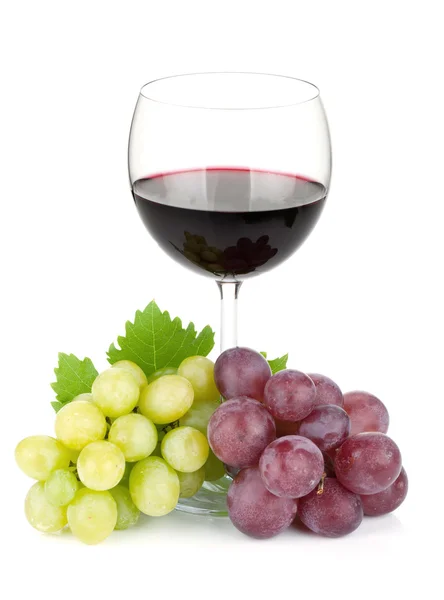 Sklenice na červené víno a hrozny — Stock fotografie