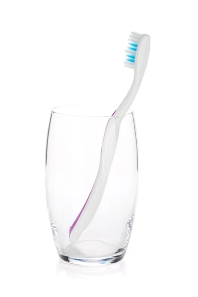 Зубна щітка в склянці — стокове фото