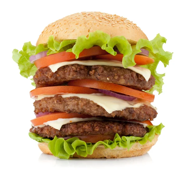 Large burger with beef, cheese, onion and tomatoes — Stock Photo, Image