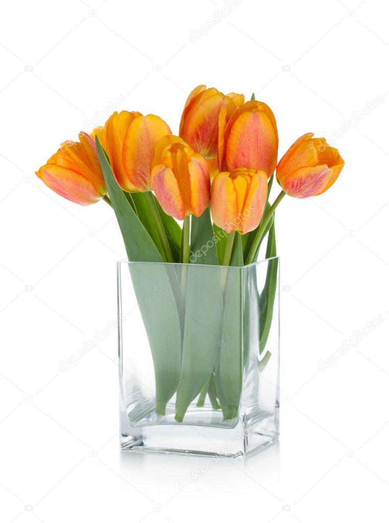 Orange tulips in flower bowl