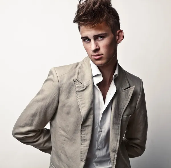 Elegant young handsome man. Studio fashion portrait. Stock Picture
