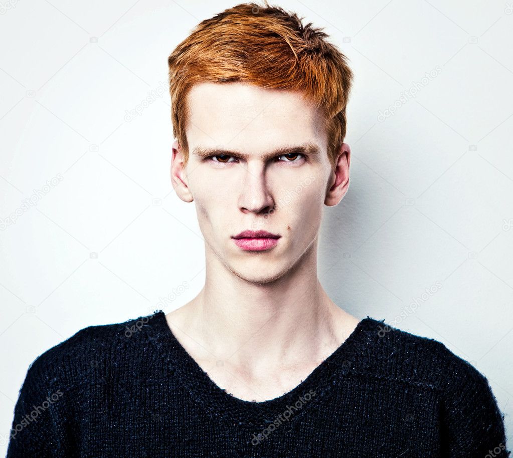 Vaccinere pin genopretning Young red haired man on light background. Stock Photo by ©innervision  11074605