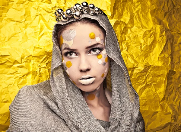 Fashion Beautiful Woman over grunge yellow background. — Stock Photo, Image