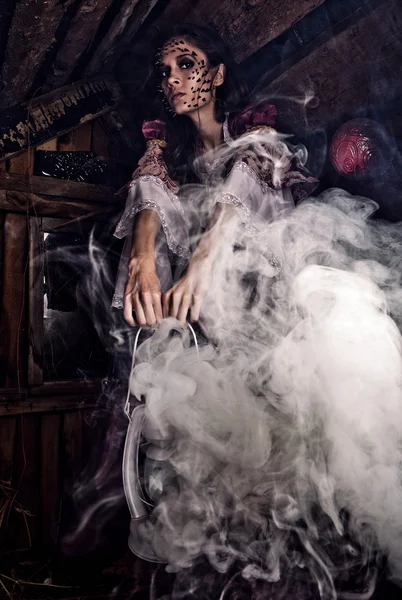 Fine art photo of a young fashion lady in a dark mystic location. — Stock Photo, Image