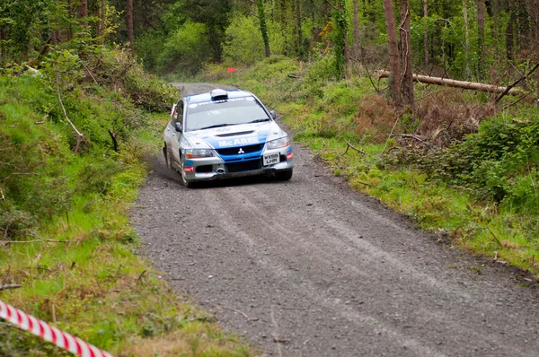 stock image V. Mcaree driving Mitsubishi Evo