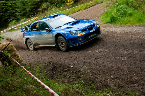 M. Cairns driving Subaru Impreza — Stock Photo, Image