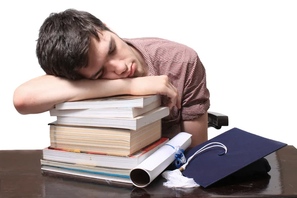 Diplomás, alszik a könyvek — Stock Fotó