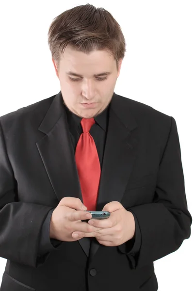 Mensajería de hombre de negocios joven en el teléfono celular —  Fotos de Stock