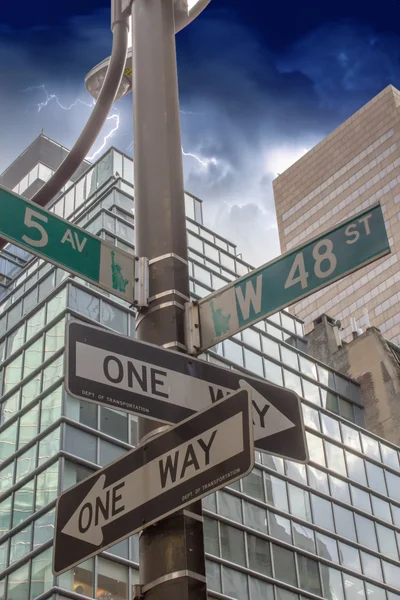 Street signs indicating Roads intersection — Stock Photo, Image