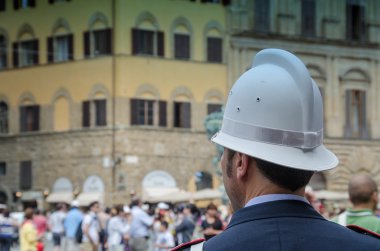 Policeman looking at the Crowd in Florence, Italy clipart