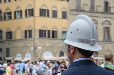 Policeman looking at the Crowd in Florence, Italy clipart