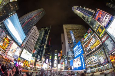 NEW YORK - MARCH 8: Illuminated facades of Broadway theaters on clipart