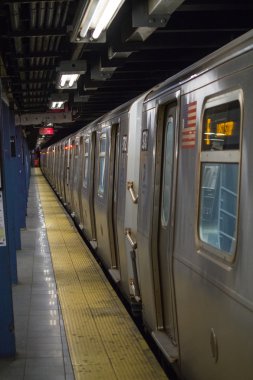 Train in subway station, photo taken in South Ferry Station on M clipart