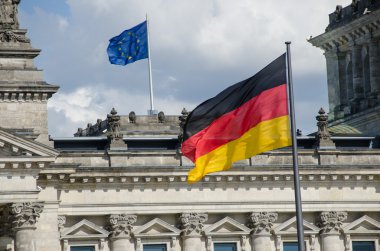 German Flag waving in front of Reichstag, Berlin clipart