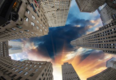 Giant Skyscrapers under a dramatic sky clipart