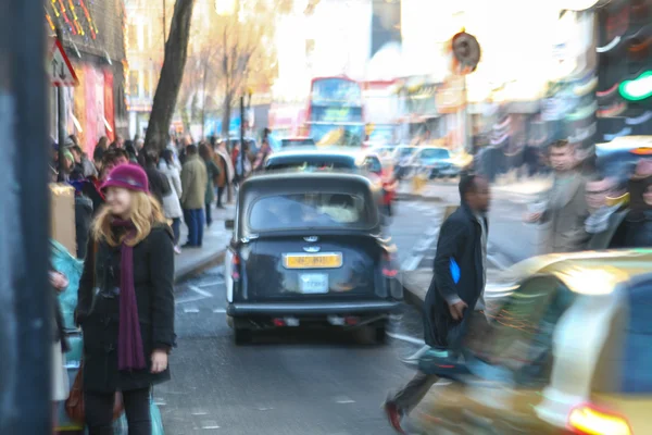 Blurred image of typical street life in London — Stock Photo, Image