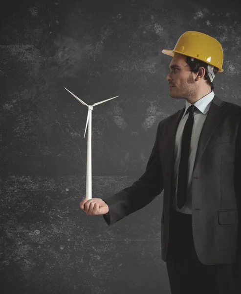 Businessman and wind turbine — Stock Photo, Image