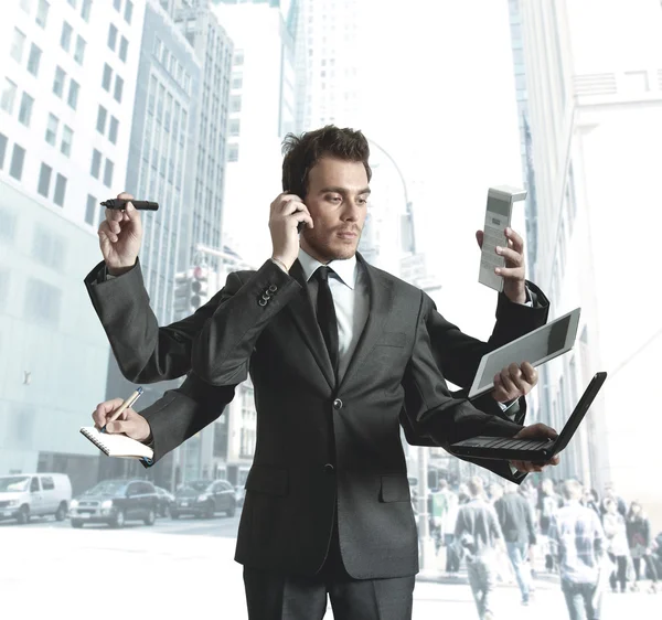 Hombre de negocios multitarea — Foto de Stock