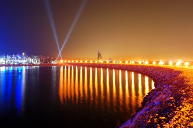 Night illumination of the luxury hotel on Palm Jumeirah man-made clipart