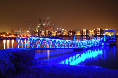 Night illumination of the luxury hotel on Palm Jumeirah man-made clipart