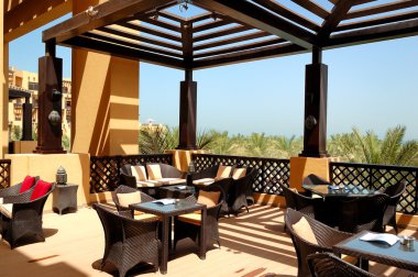 Sea view terrace of outdoor restaurant at luxury hotel, Ras Al K clipart