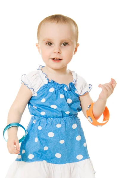 Bambina con braccialetti sulle mani — Foto Stock