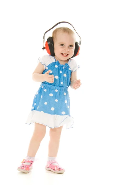 A menina em fones de ouvido — Fotografia de Stock