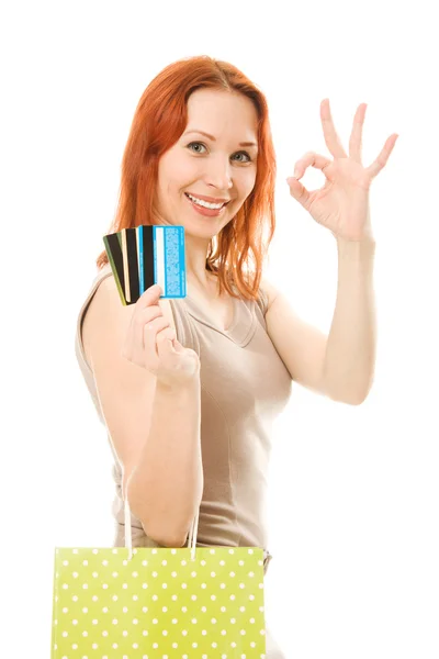 Mujer con tarjetas de crédito y compras . — Foto de Stock