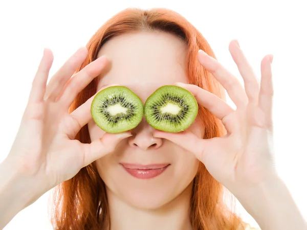 stock image Young woman with kiwi in the hands