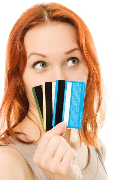 Mujer con muchas tarjetas de crédito diferentes . Imagen de archivo