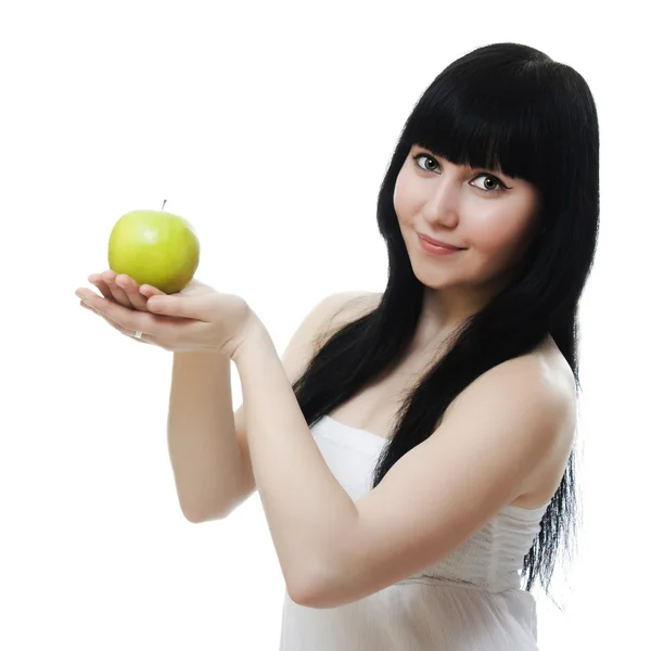 Porträt einer schönen Frau mit einem Apfel in der Hand — Stockfoto