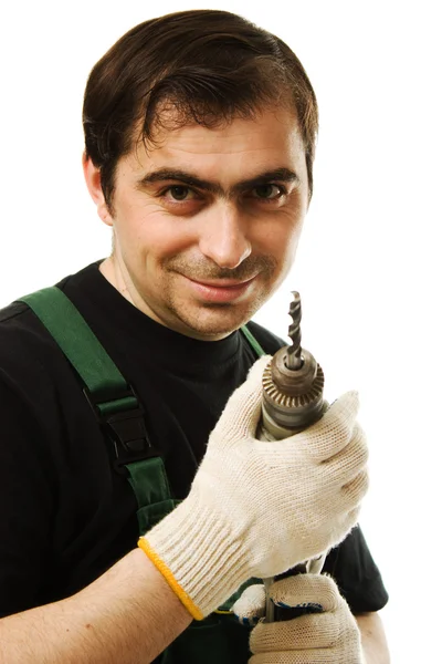 Hombre trabajador con un dril eléctrico — Foto de Stock