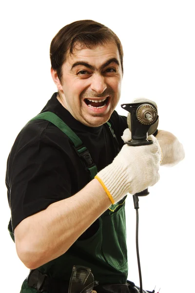 Mannelijke werknemer met een elektrische dril — Stockfoto