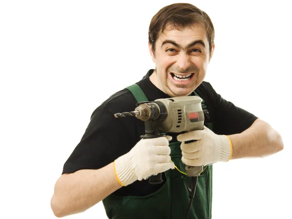 Travailleur masculin avec un dril électrique — Photo