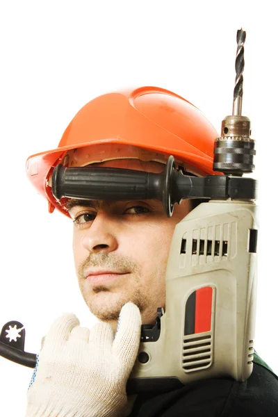 Férfi munkavállaló az elektromos dril — Stock Fotó