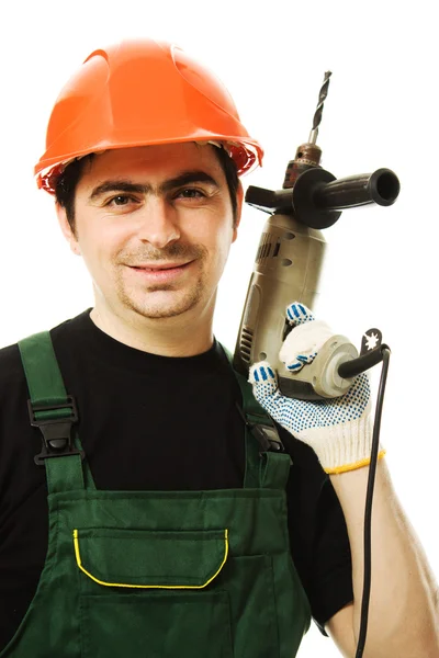Hombre trabajador con un dril eléctrico —  Fotos de Stock