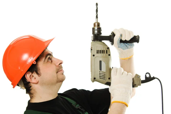 Bir elektrik dril ile erkek işçi — Stok fotoğraf
