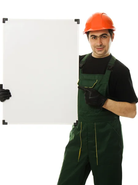 Constructor senior sosteniendo el tablero en blanco — Foto de Stock