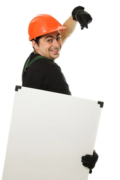 Constructor senior sosteniendo el tablero en blanco —  Fotos de Stock