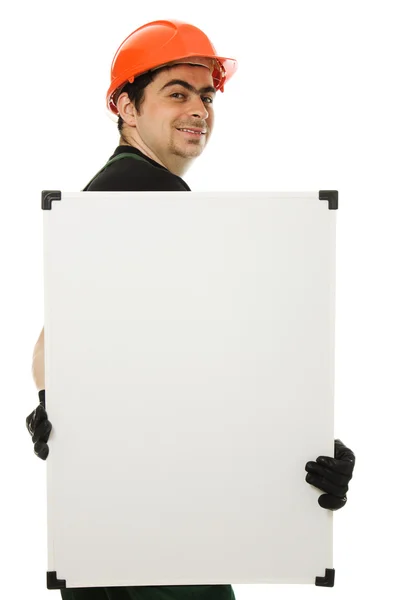 Constructor senior sosteniendo el tablero en blanco —  Fotos de Stock