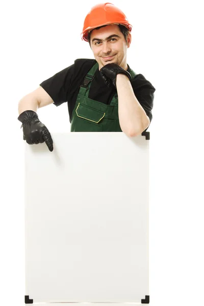 stock image Senior constructor holding the blank board