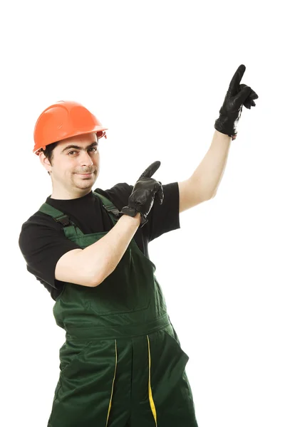 Businessman in helmet pointing up. — Stock Photo, Image