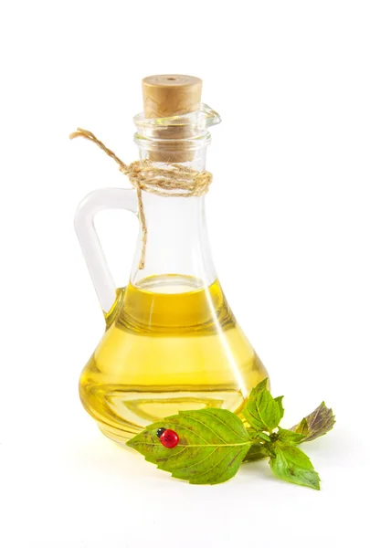 stock image Jug of oil and basil