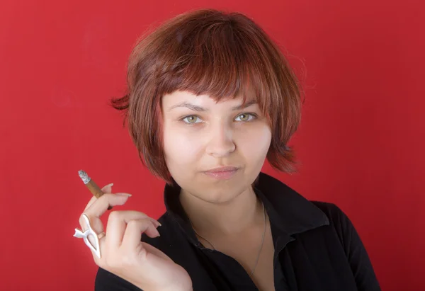 Girl with a cigar — Stock Photo, Image