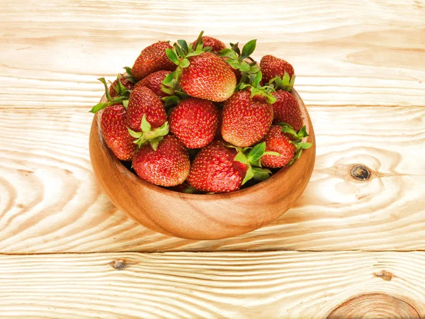 Strawberry on wood background selective focus — Stok fotoğraf