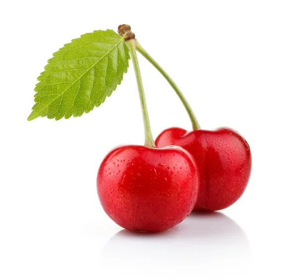 Ripe cherry berries with green leaf isolated on white — Stock Photo, Image