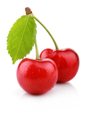 Ripe cherry berries with green leaf isolated on white clipart